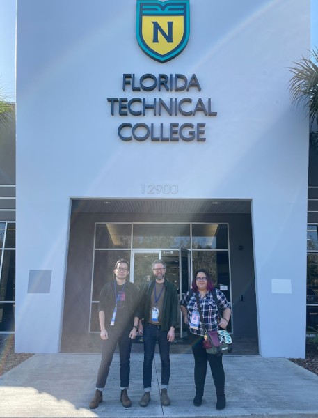 Evolving Web team members stand in front of Florida Technical College